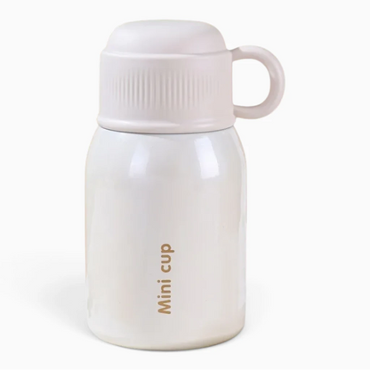 Gourde isotherme café compacte avec poignée ergonomique intégrée