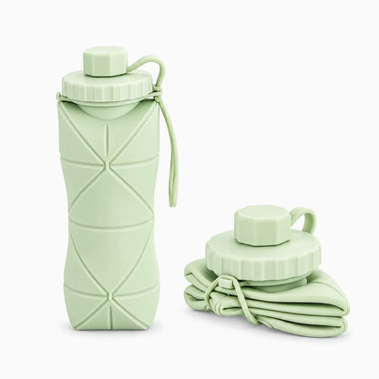 Gourde compote réutilisable silicone 600 ml de couleur rose, souple et pliable