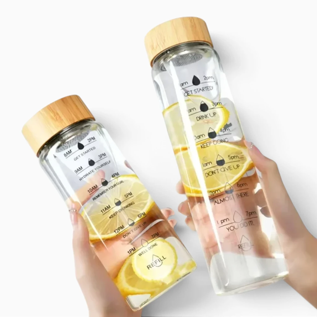 Détail du couvercle en bambou naturel sur gourde motivation 1000 ml avec repères visuels horaires