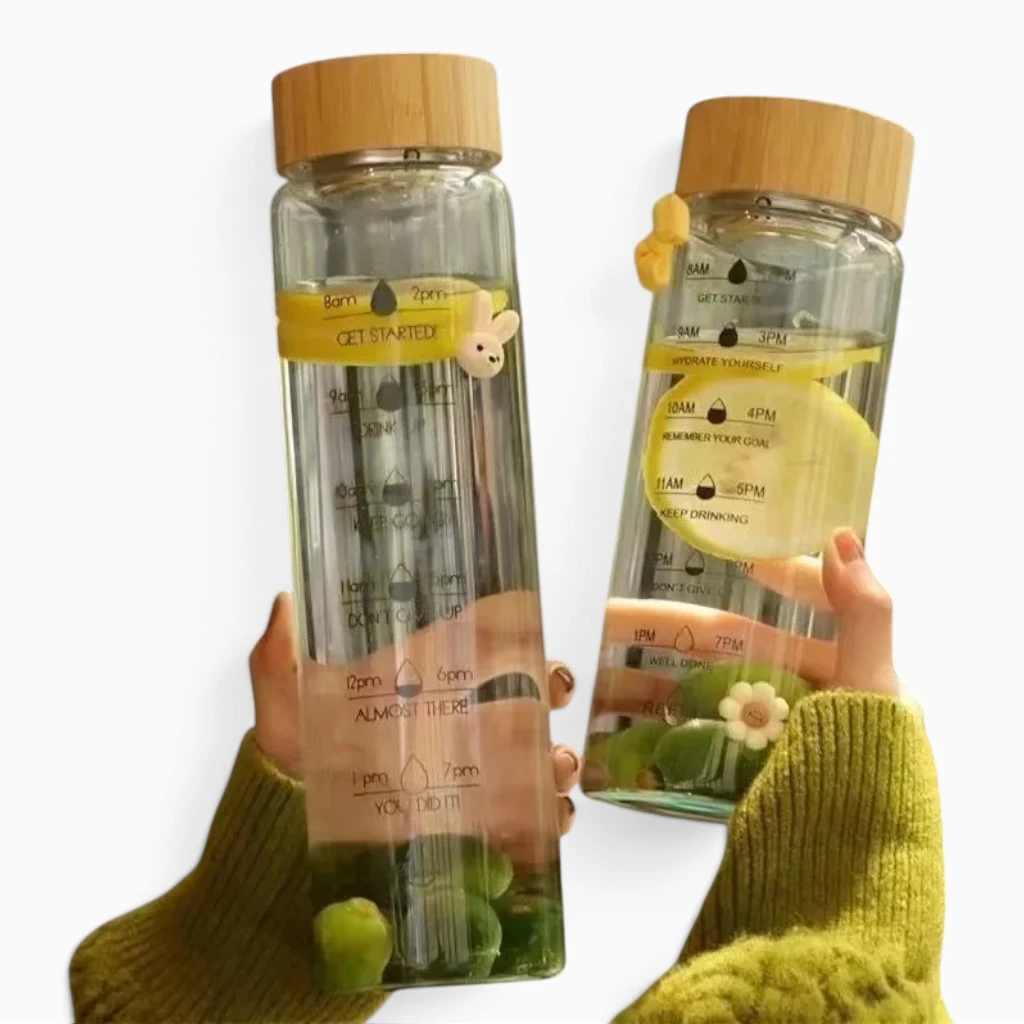 Bouteille réutilisable de 700 ml dotée d'un système d'infusion intégré et marquages temporels graduels