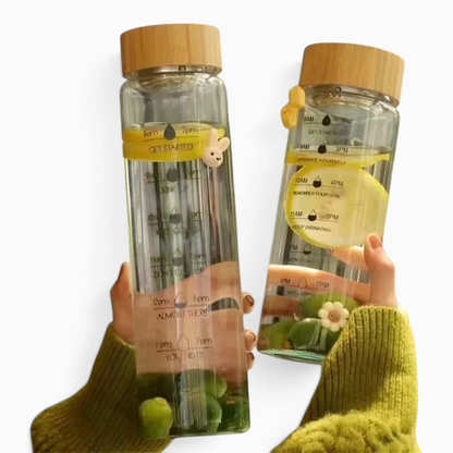Bouteille réutilisable de 700 ml dotée d'un système d'infusion intégré et marquages temporels graduels