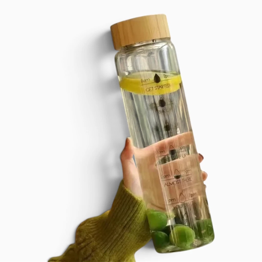 Gourde de motivation affichant les repères de temps pour suivre sa consommation d'eau heure par heure